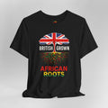 Black t-shirt with a design of a tree with British flag leaves and 'British Grown African Roots' text on a gray background.