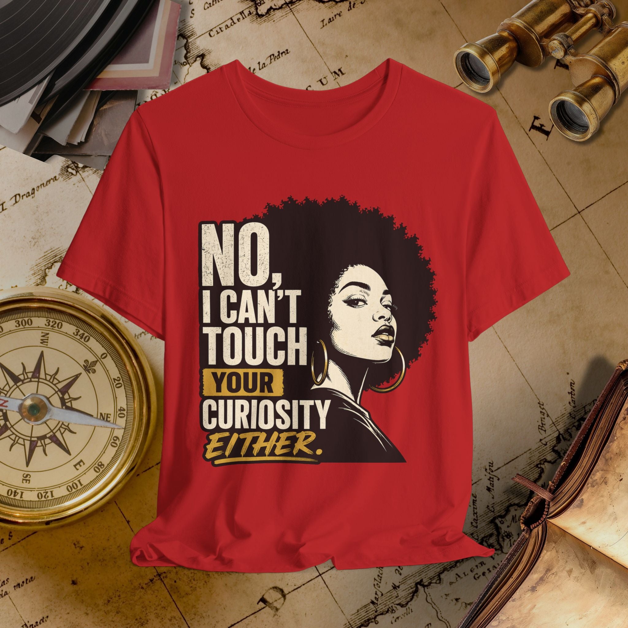 Red t-shirt with graphic and text on a vintage background