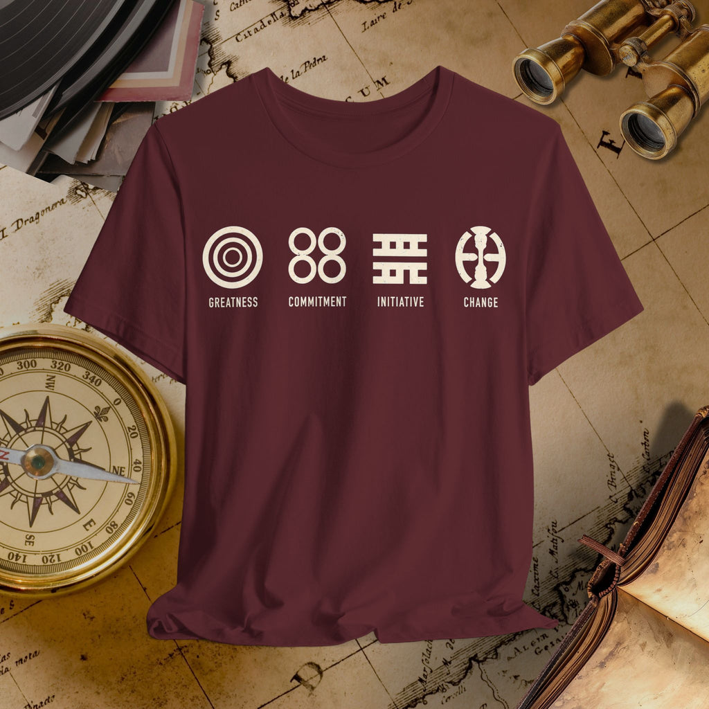 Maroon t-shirt with white symbols and text on a vintage map background