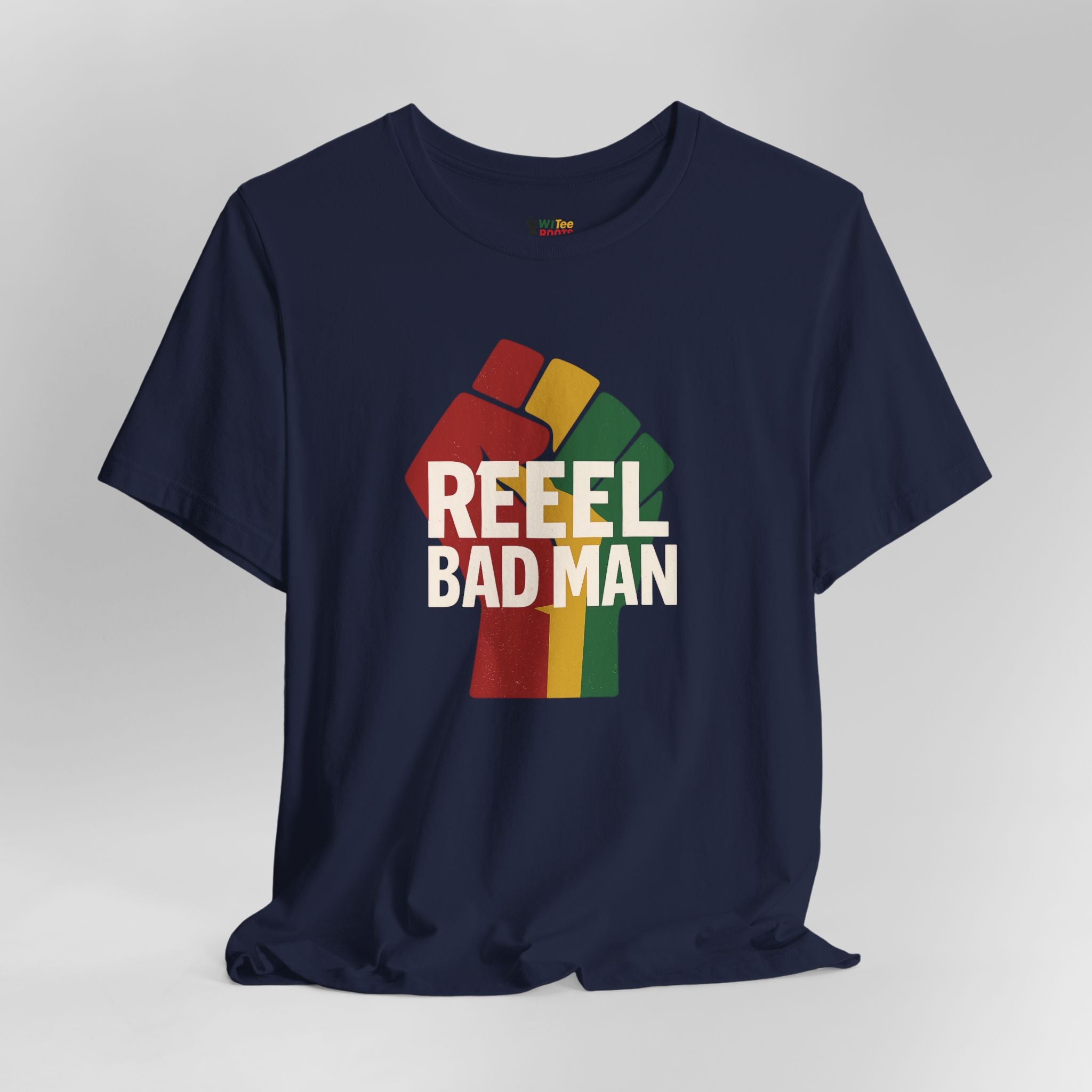 Navy blue t-shirt with colorful graphic and 'REEEL BAD MAN' text on a gray background