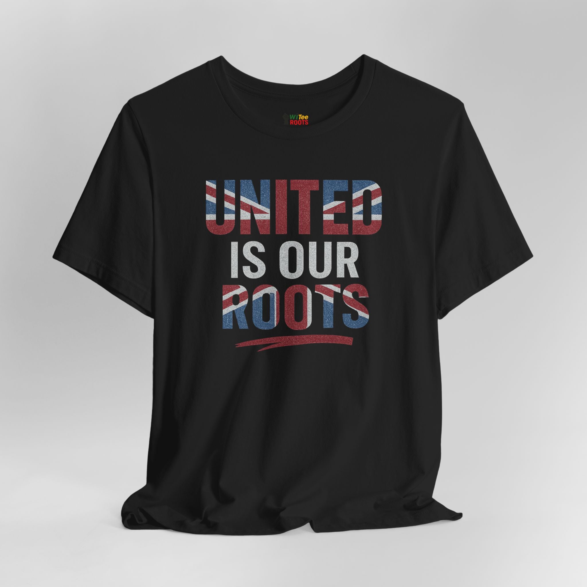 Black t-shirt with 'UNITED IS OUR ROOTS' text on a gray background