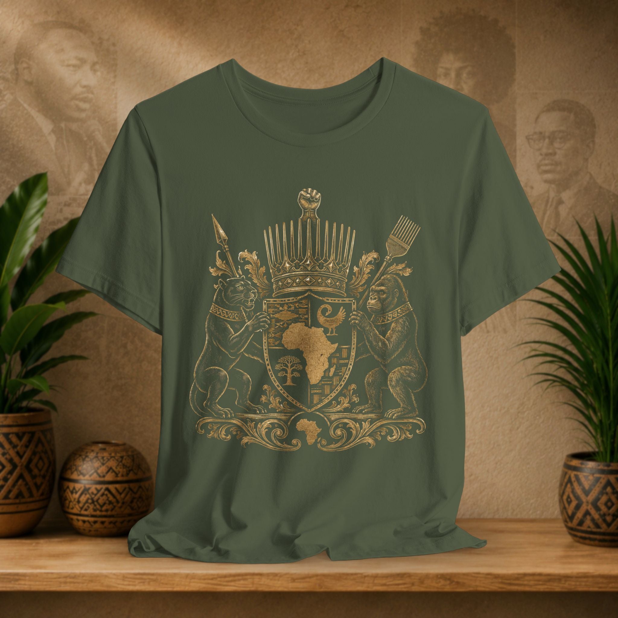 Green t-shirt with a gold emblem on a wooden surface with plants and decorative items.