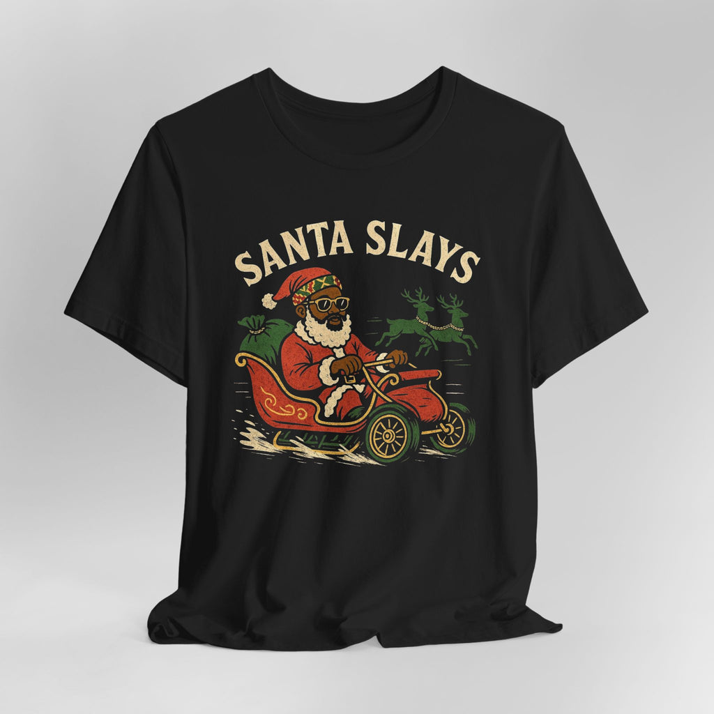 Black t-shirt with a graphic of a reindeer driving a car wearing a Santa hat and sunglasses, with 'Santa Slays' text above.