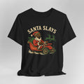 Black t-shirt with a graphic of a reindeer driving a car wearing a Santa hat and sunglasses, with 'Santa Slays' text above.