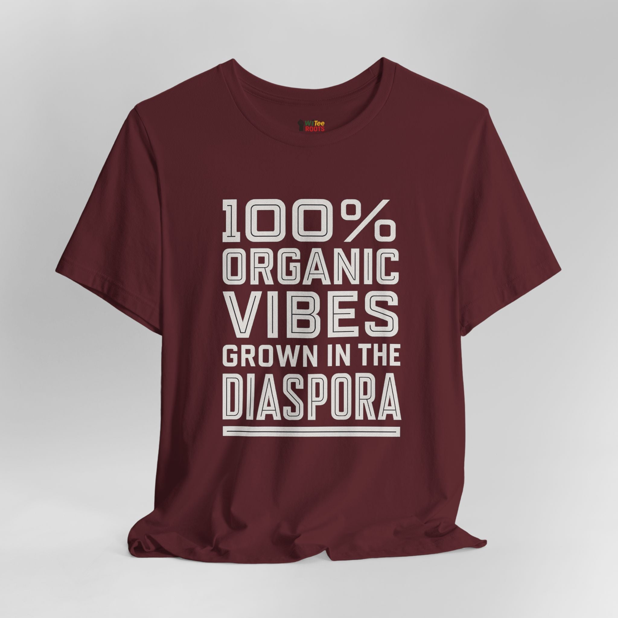 Maroon t-shirt with white text on a gray background