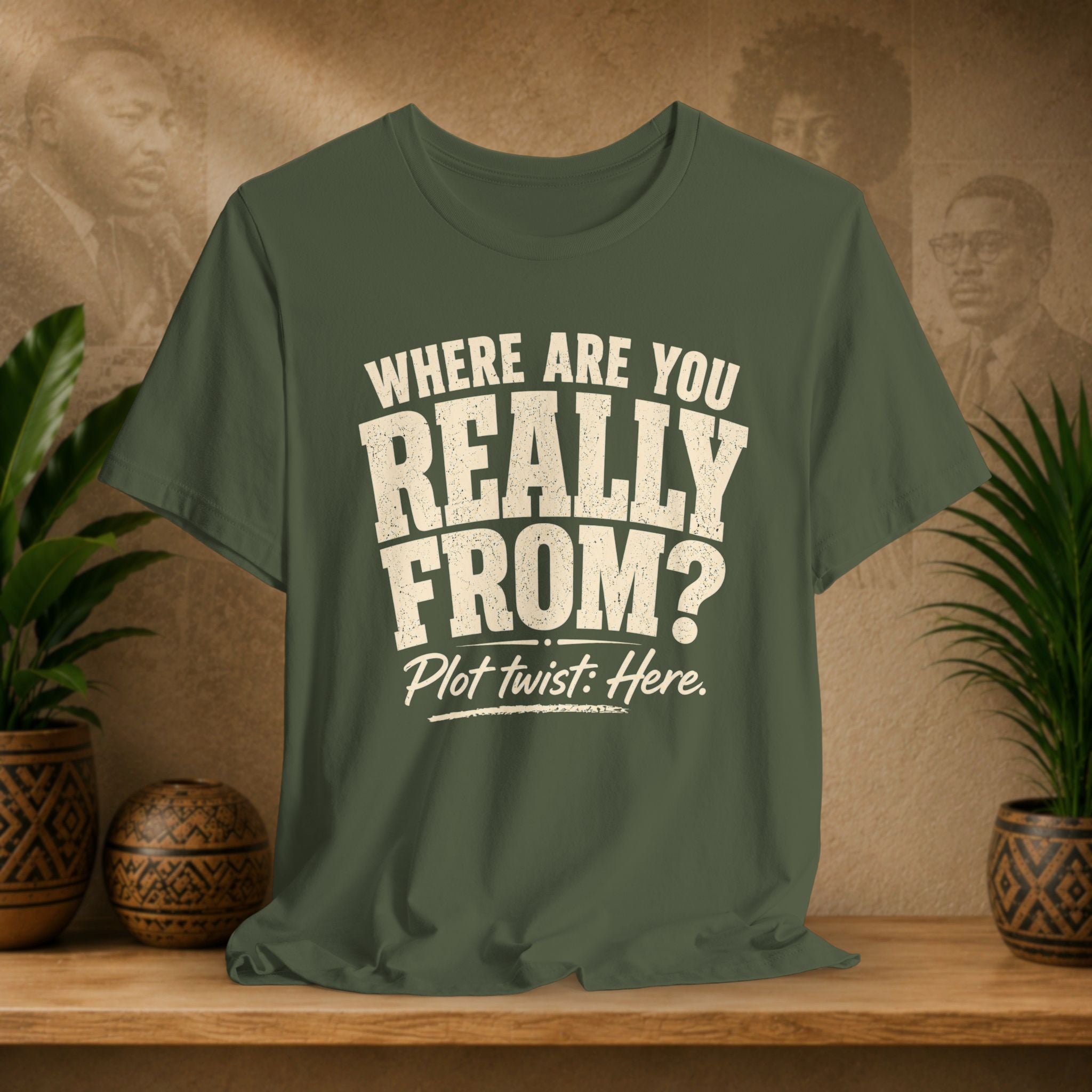 Green t-shirt with humorous text design on a wooden surface with plants and decorative items.