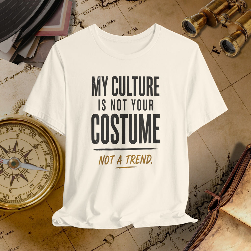 Beige t-shirt with 'My culture is not your costume, not a trend' text on a vintage map background.