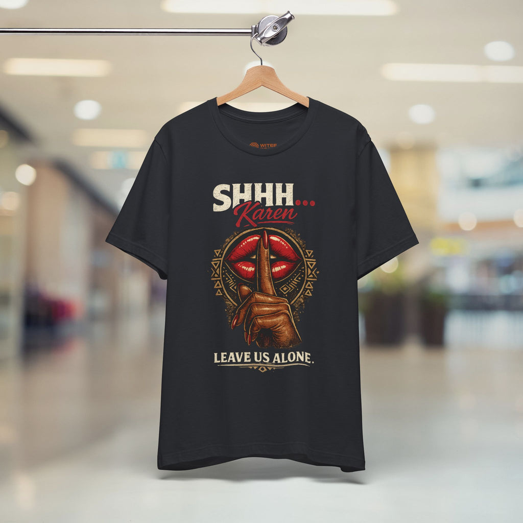 Black t-shirt with Africa map graphic and text on a hanger in a store.