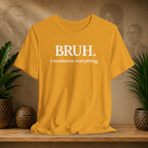 A mustard yellow short-sleeve t-shirt with white printed text reading 'BRUH. I moisturise everything.