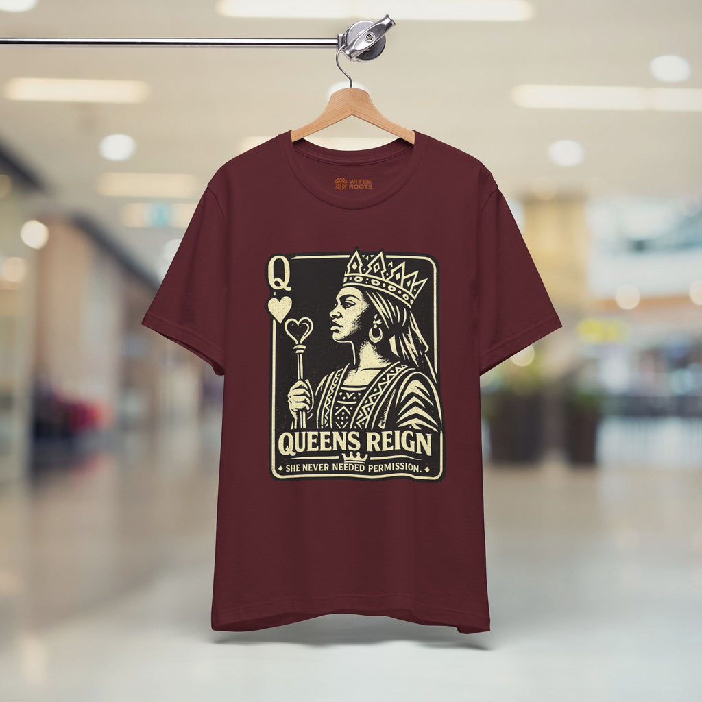 Maroon t-shirt with a graphic design of a queen and text 'Queens Reign'.