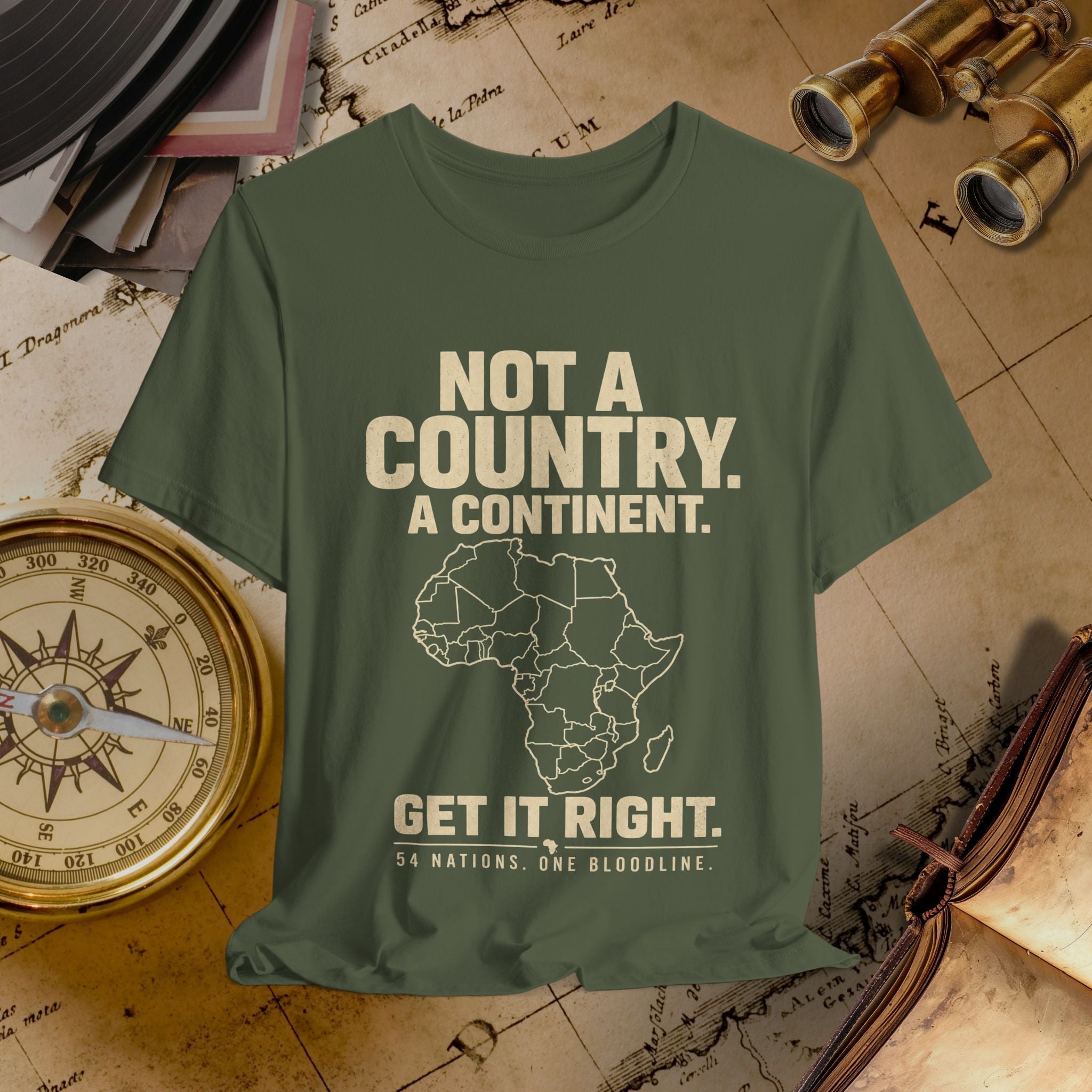 Green t-shirt with text and map design on a vintage map background