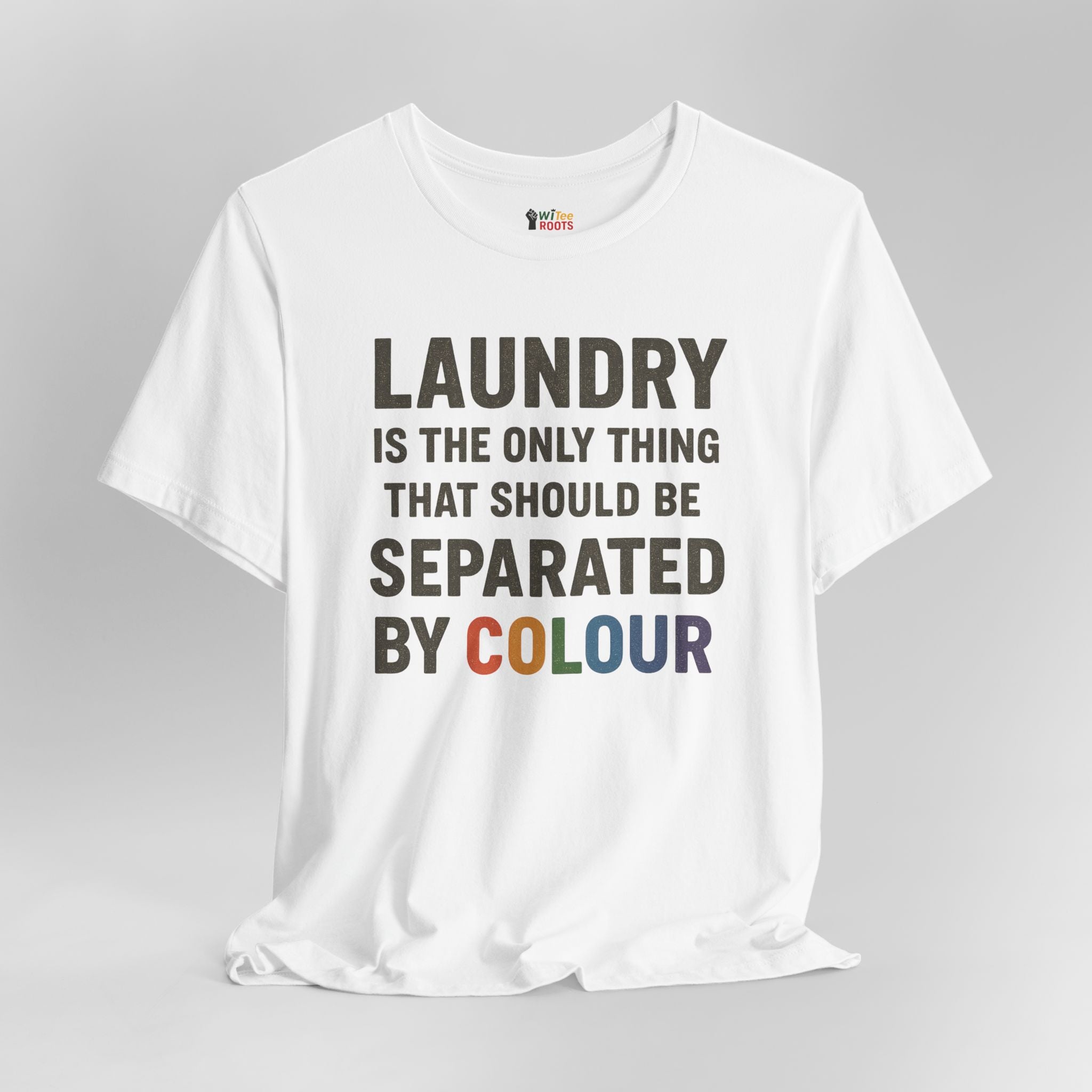 White t-shirt with humorous laundry text design on a gray background