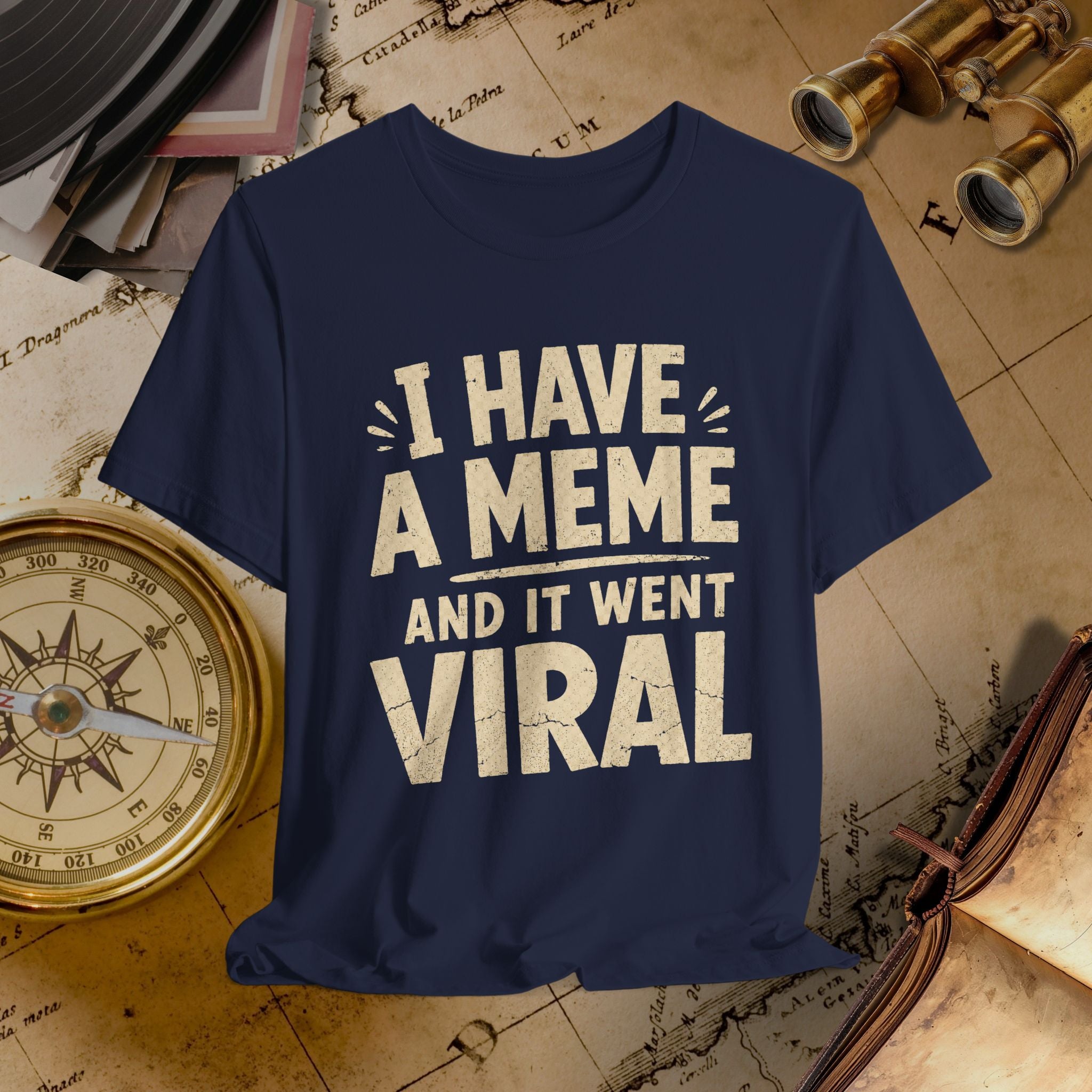 Navy blue t-shirt with 'I have a meme and it went viral' text on an old map background.
