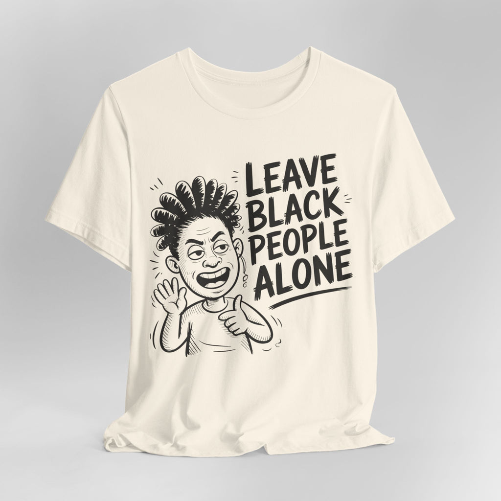 Cream t-shirt with a graphic and text 'Leave Black People Alone' on a gray background