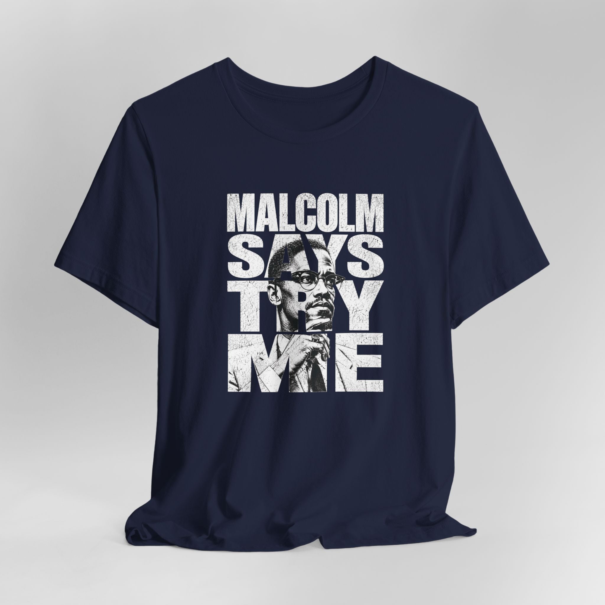 Navy blue t-shirt with graphic design and text on a gray background