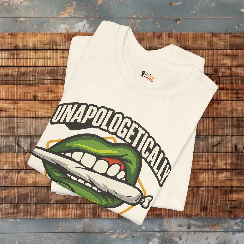 Beige t-shirt with graphic design and text on a wooden surface