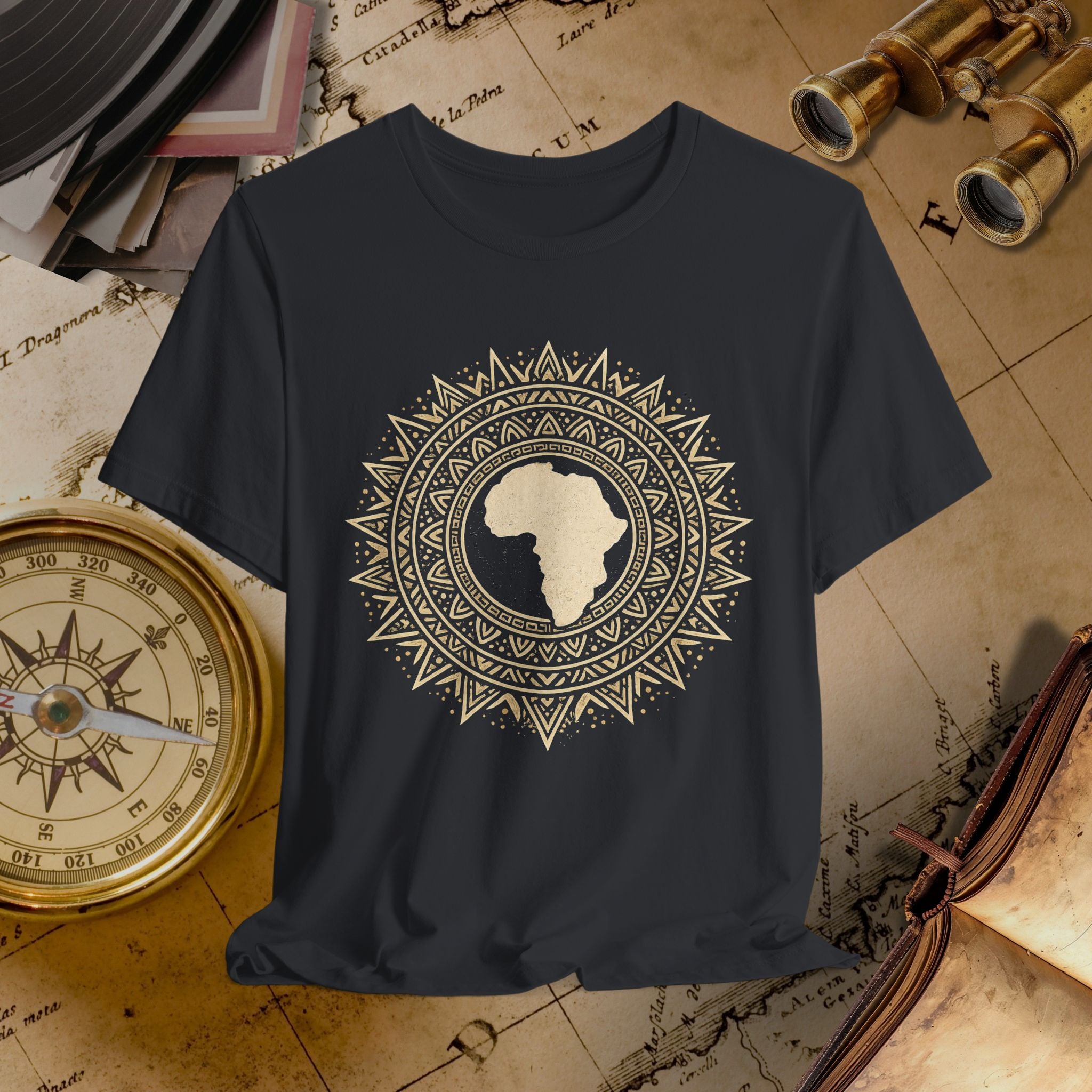 Black t-shirt with a decorative design on a vintage map background