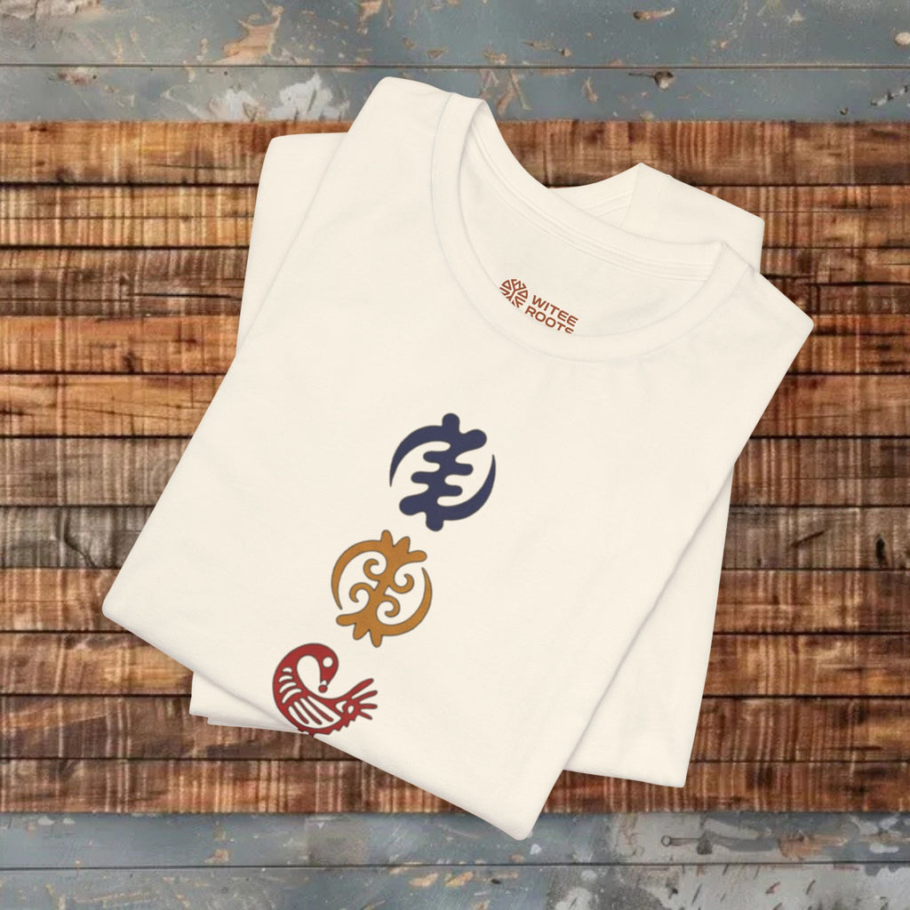 Sand t-shirt with colorful symbols on a wooden surface