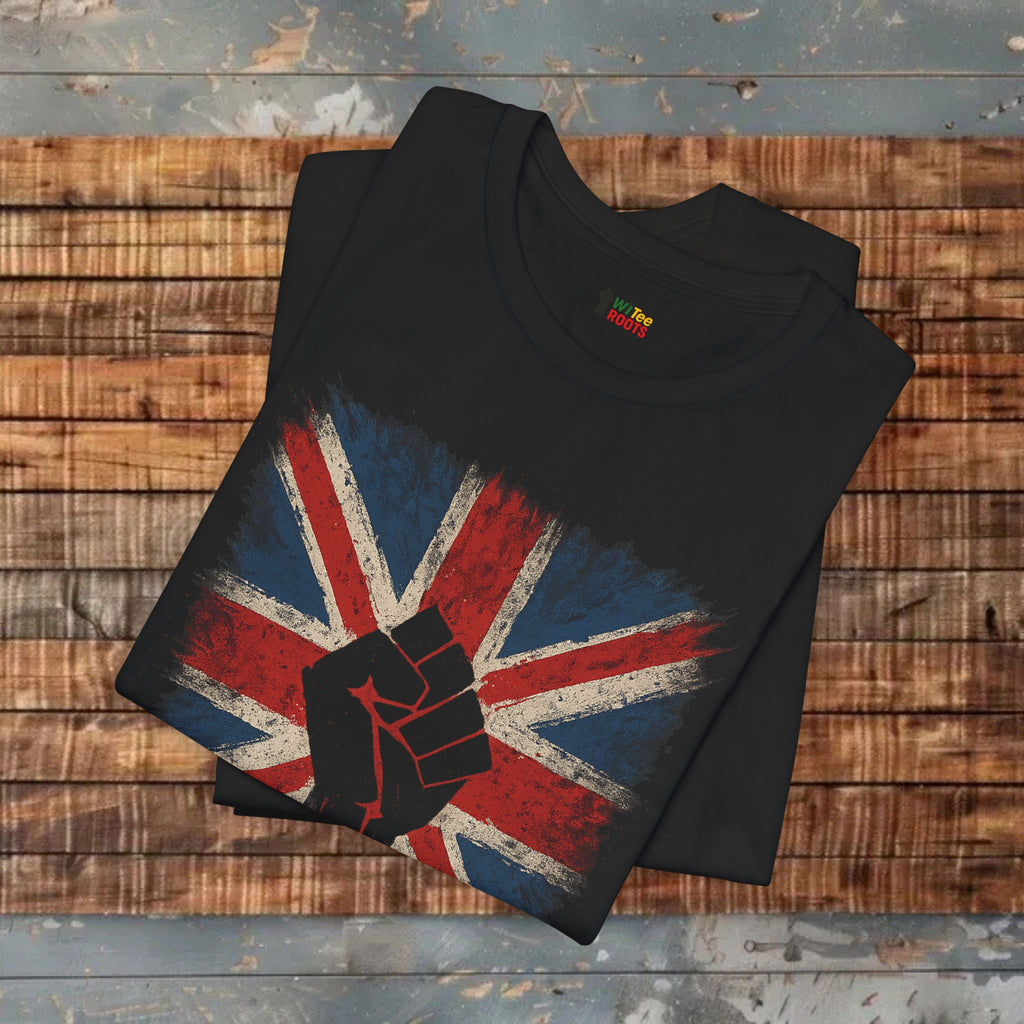 Black t-shirt with a Union Jack and fist design on a wooden surface