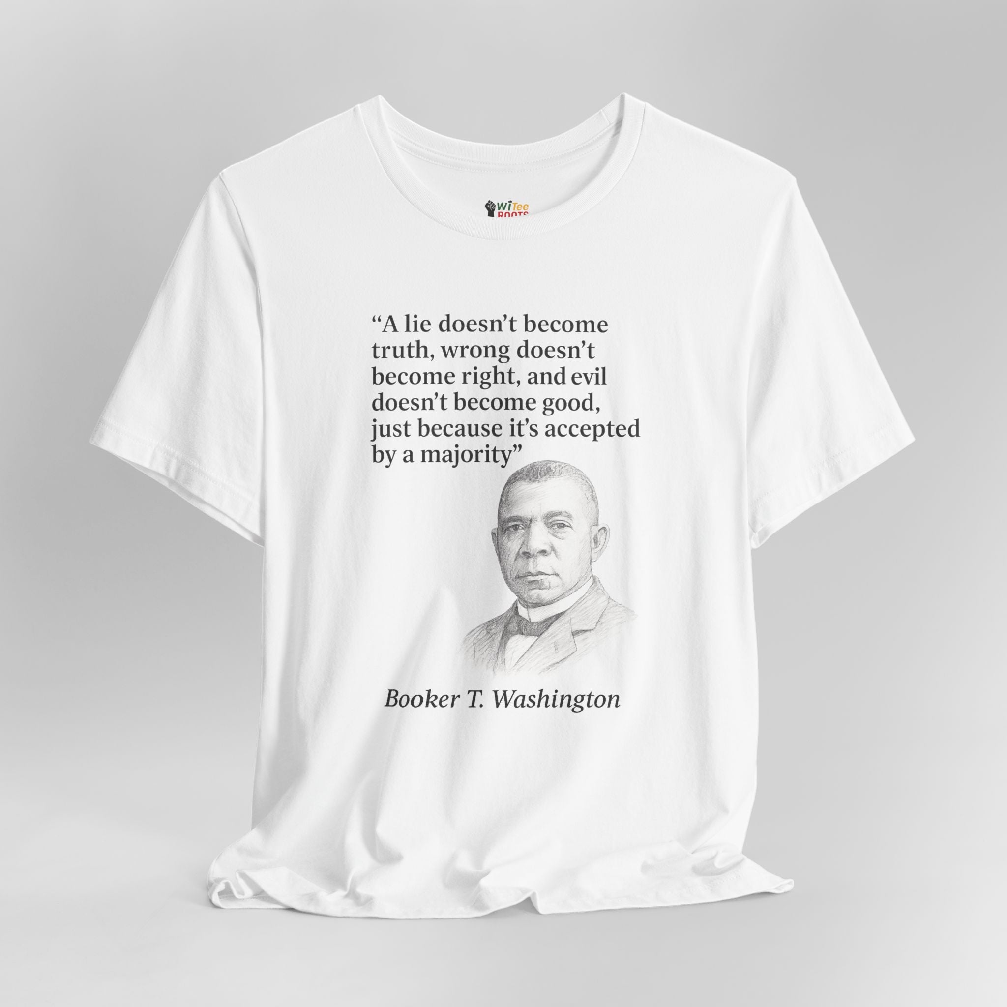 White t-shirt with Booker T. Washington's quote on a gray background