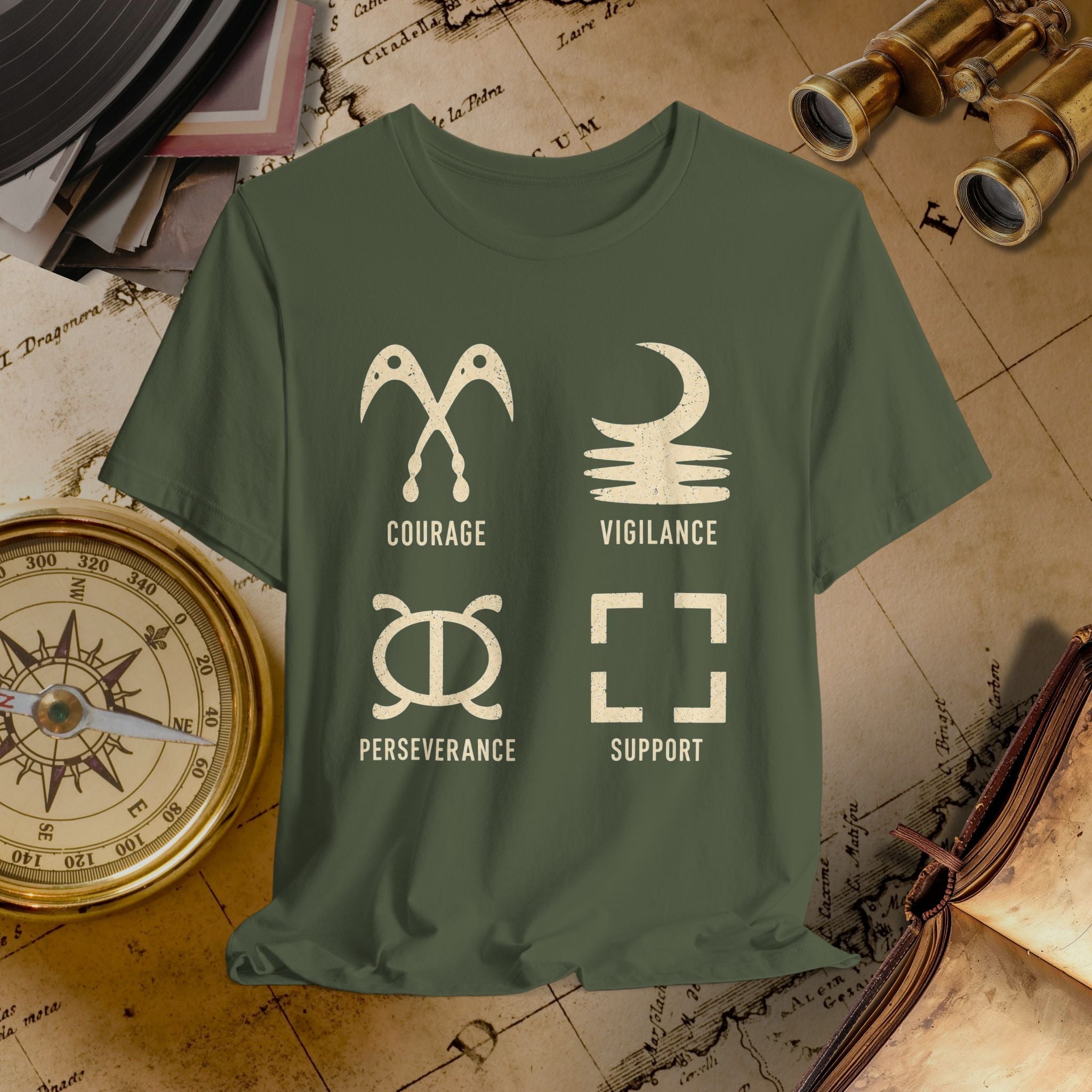 Green t-shirt with symbols and text on a vintage map background