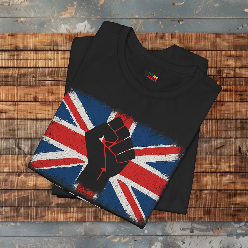 Black t-shirt with a Union Jack design featuring a black fist on a wooden surface