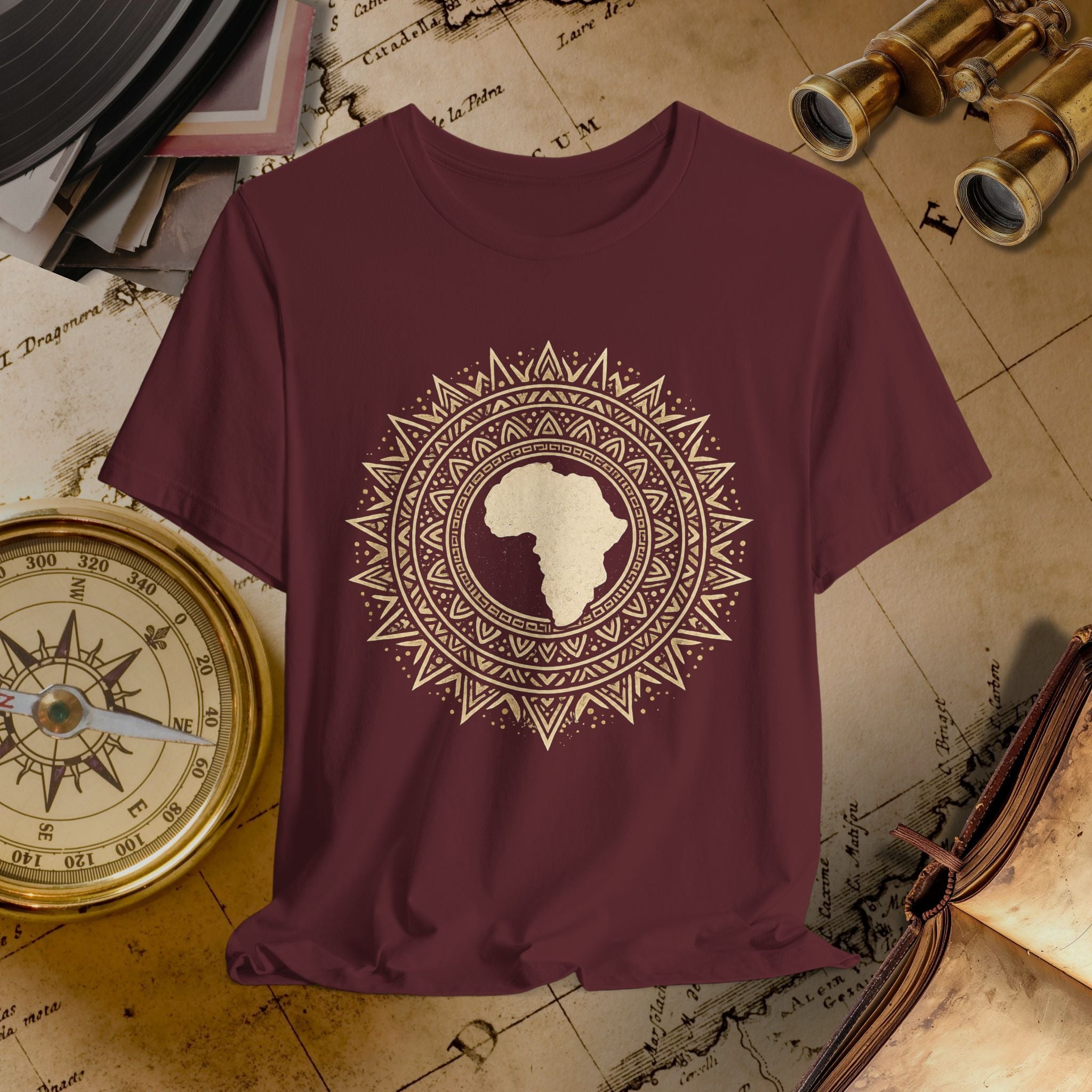 Maroon t-shirt with African design on a vintage map background