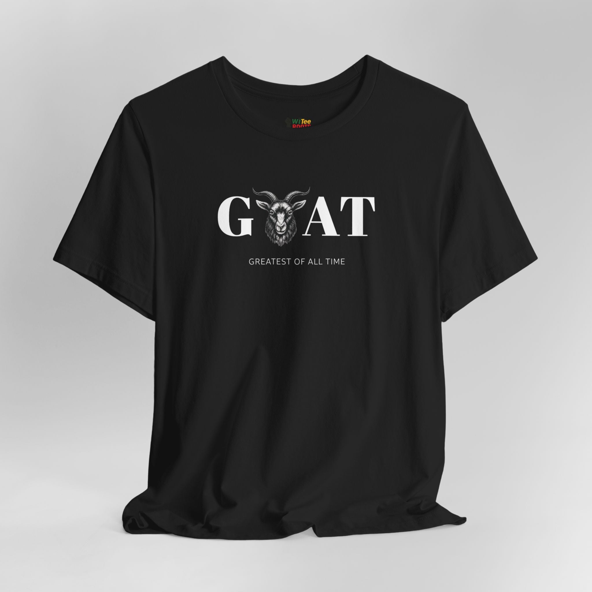 Black t-shirt with 'Greatest of All Time' text and goat graphic on a gray background