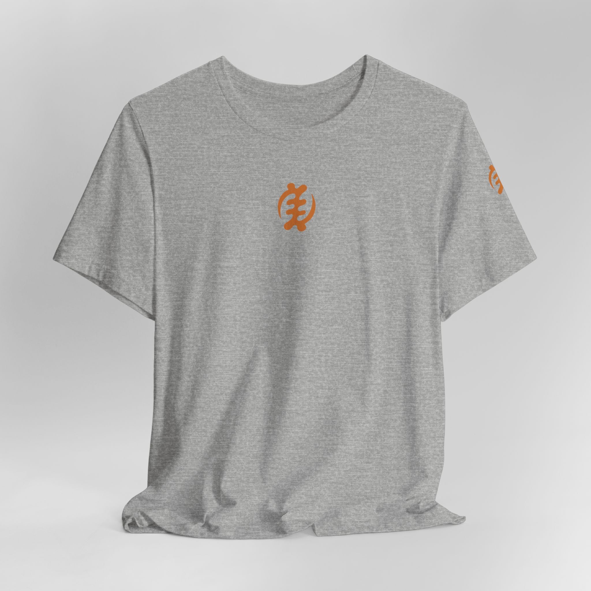 Gray t-shirt with orange logo on a light gray background
