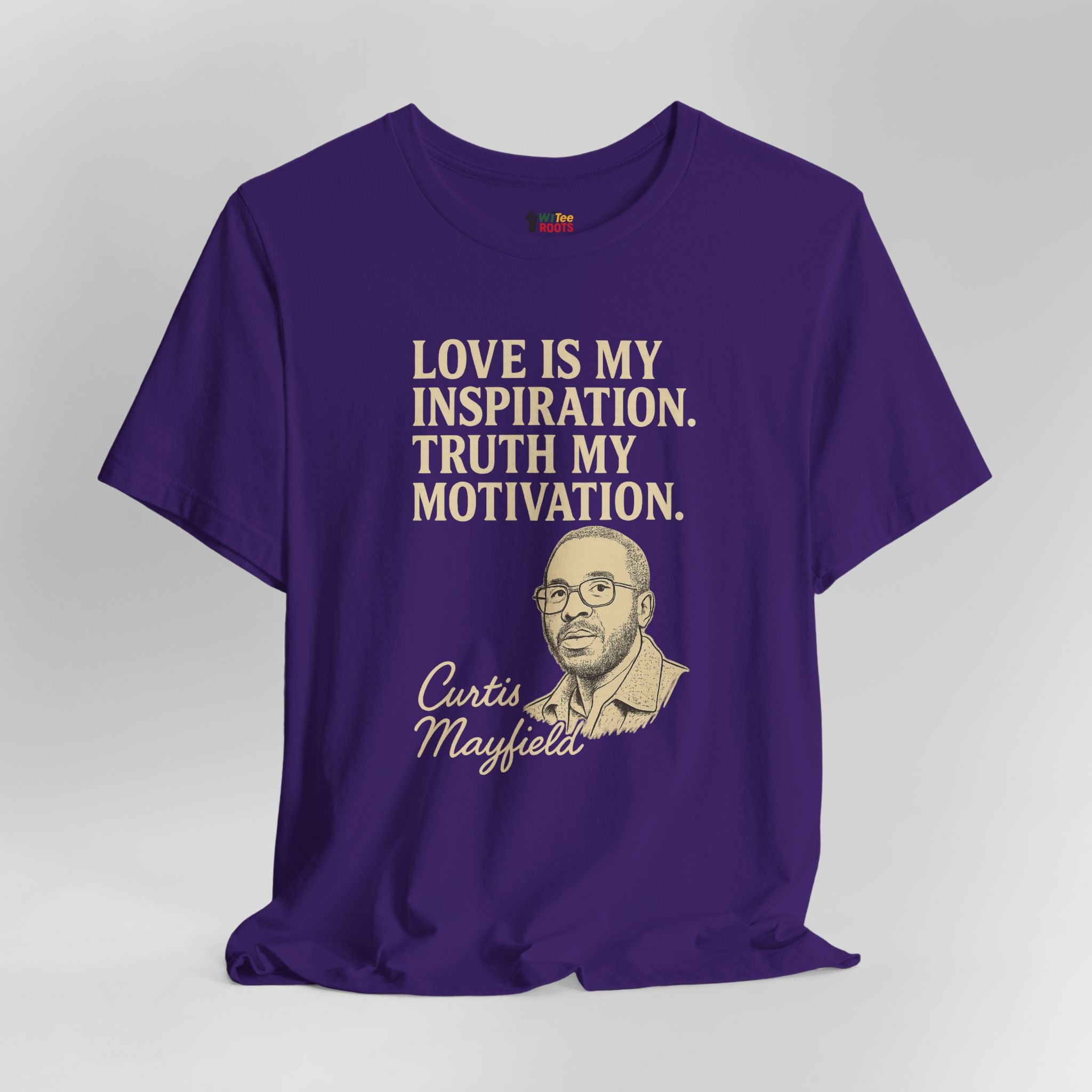 Purple t-shirt with text and a portrait on a gray background
