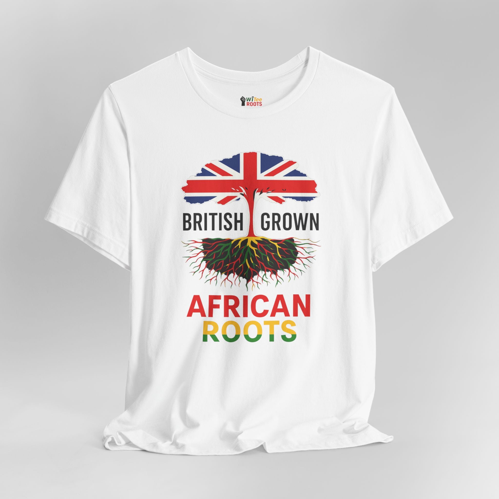 White t-shirt with 'British Grown African Roots' design on a gray background