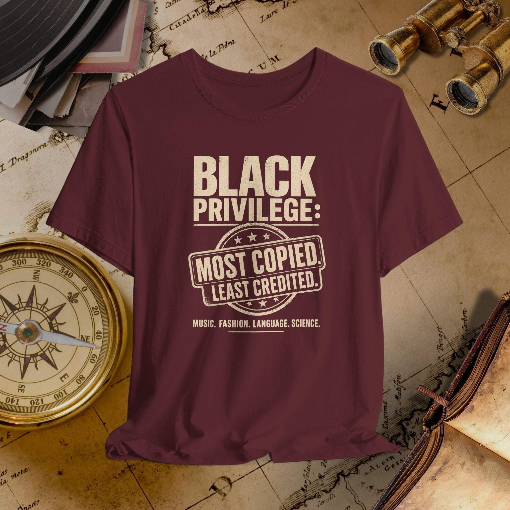 Maroon t-shirt with 'Black Privilege' text on a vintage map background