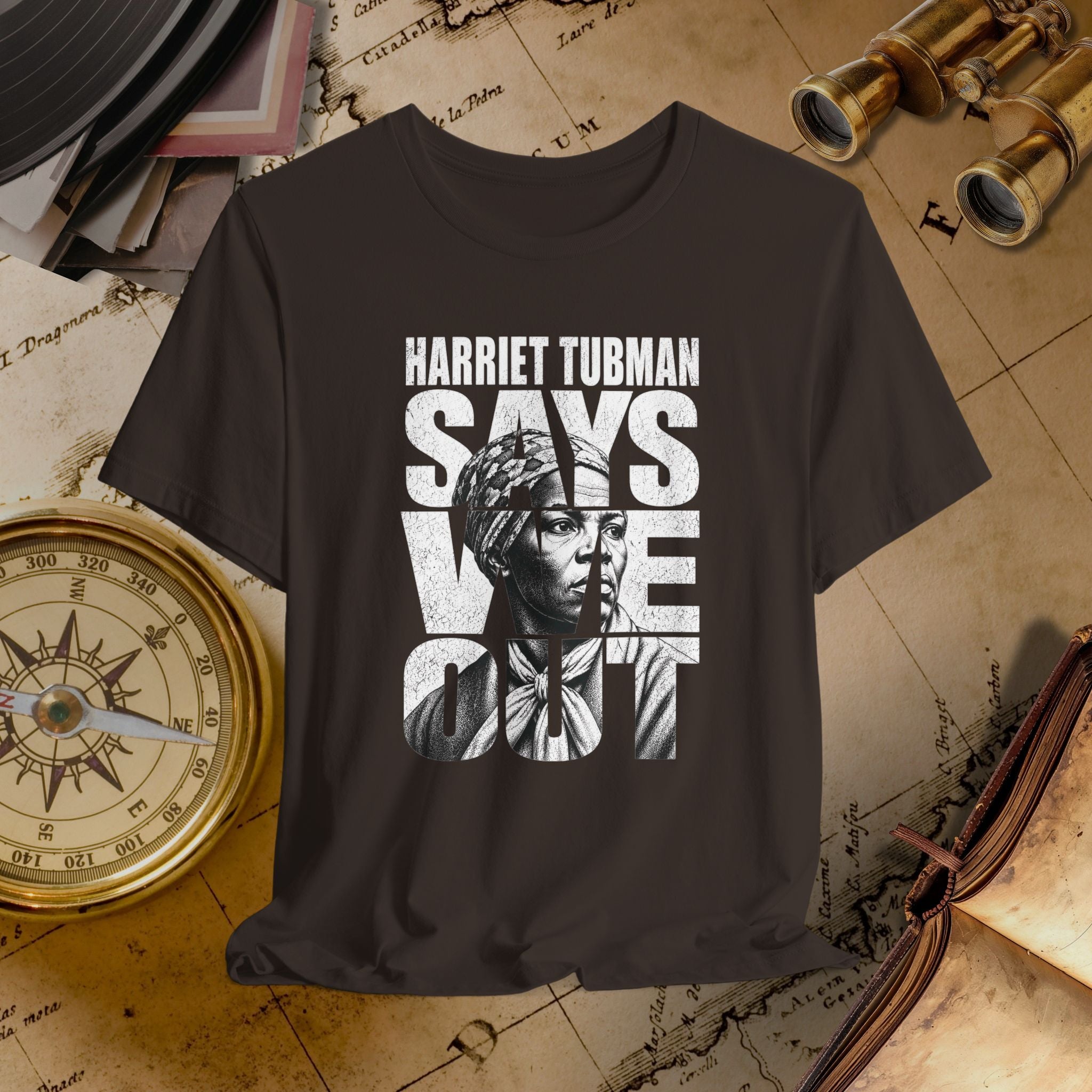 Brown t-shirt with Harriet Tubman graphic and text on a vintage map background