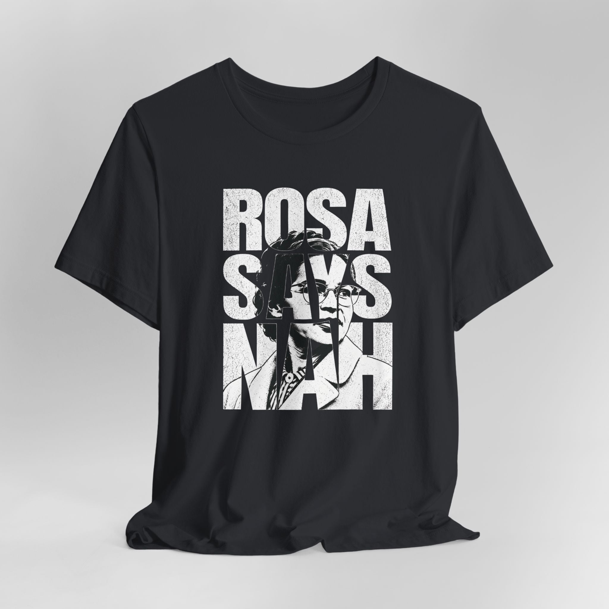 Black t-shirt with white graphic and text on a gray background