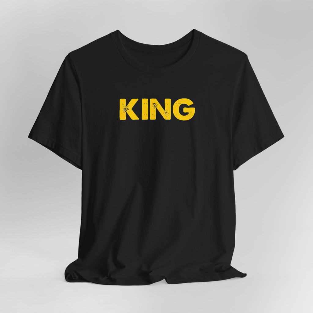 Black t-shirt with 'KING' printed in yellow on a gray background