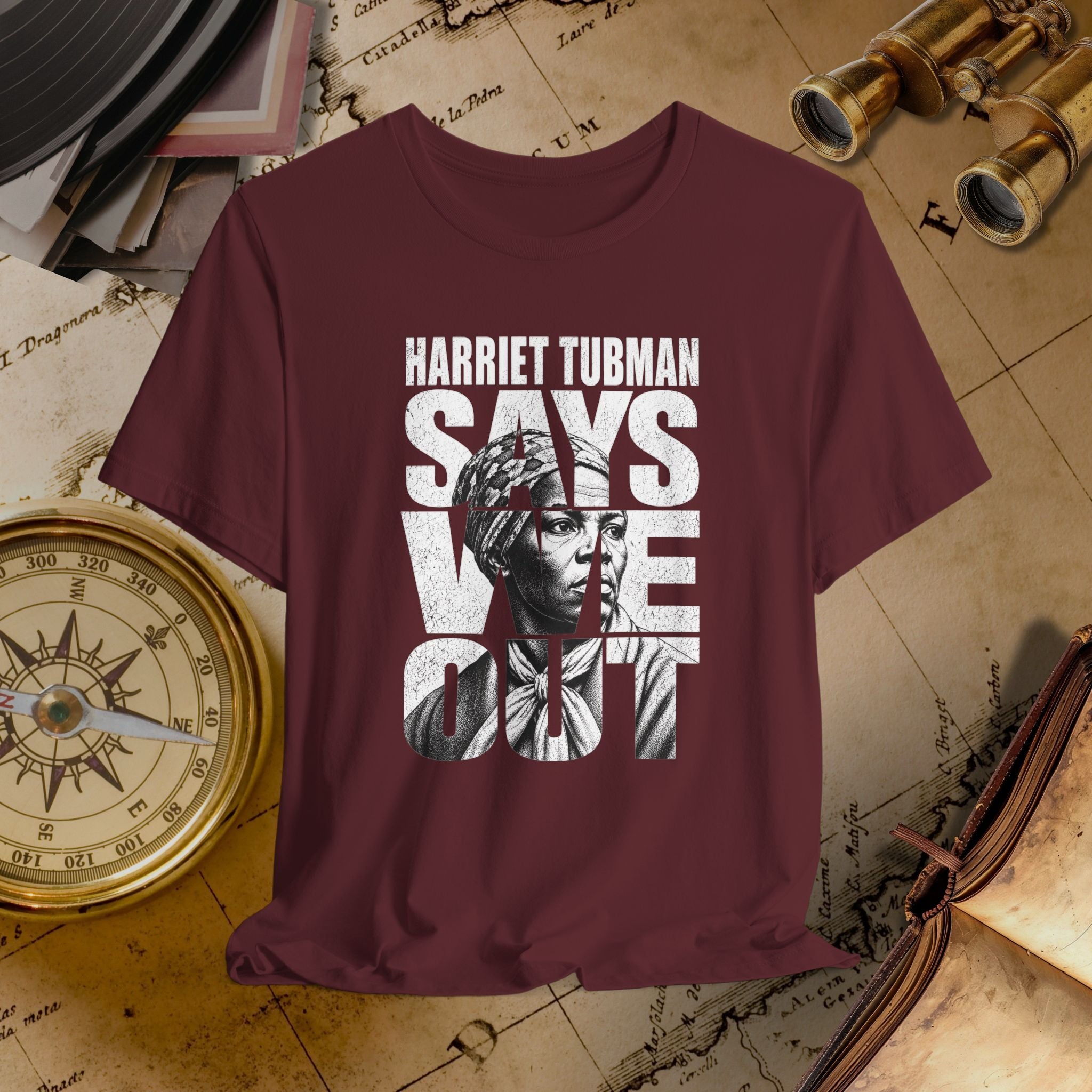 Maroon t-shirt with Harriet Tubman graphic and text on a vintage map background