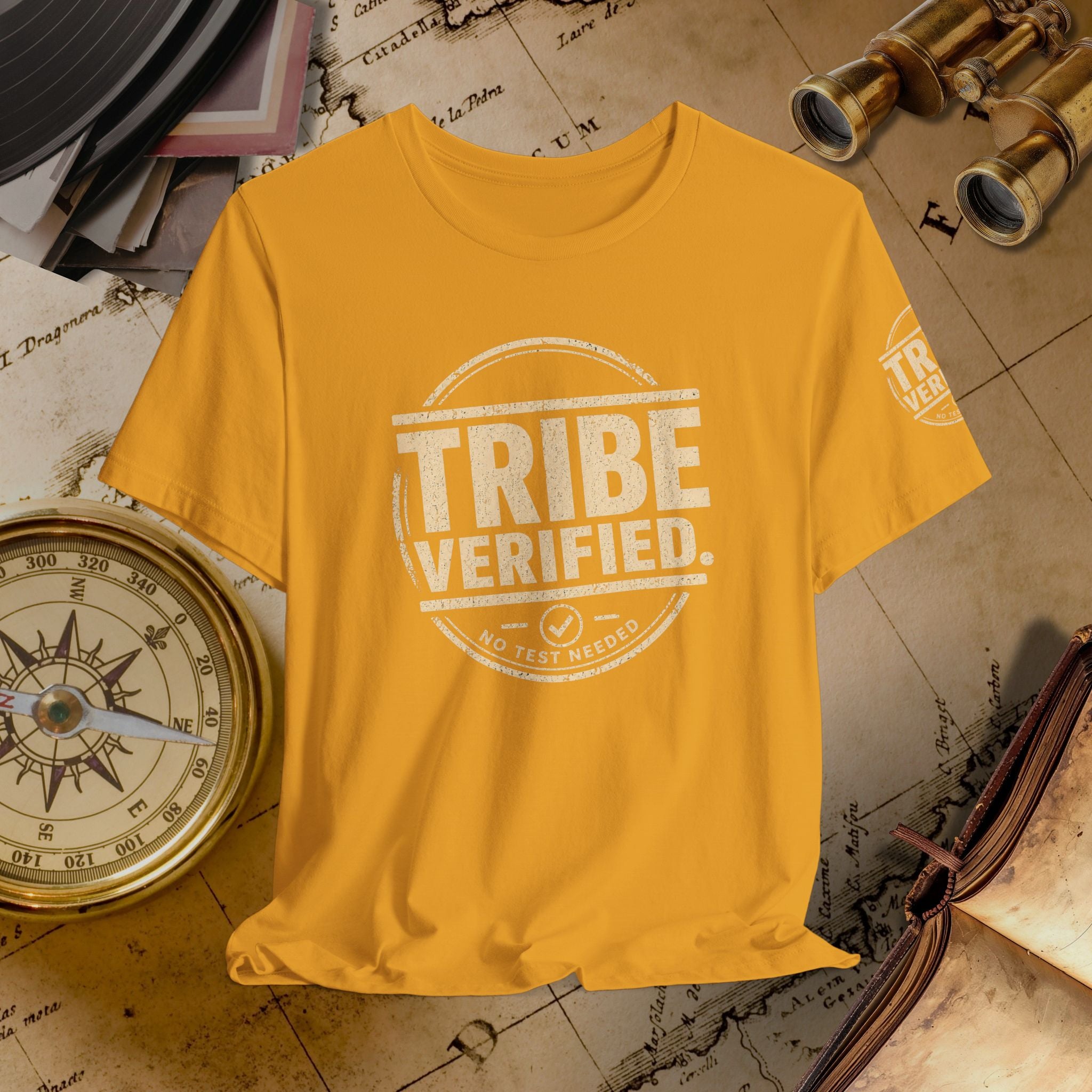 Yellow t-shirt with 'TRIBE VERIFIED' text on a vintage map background