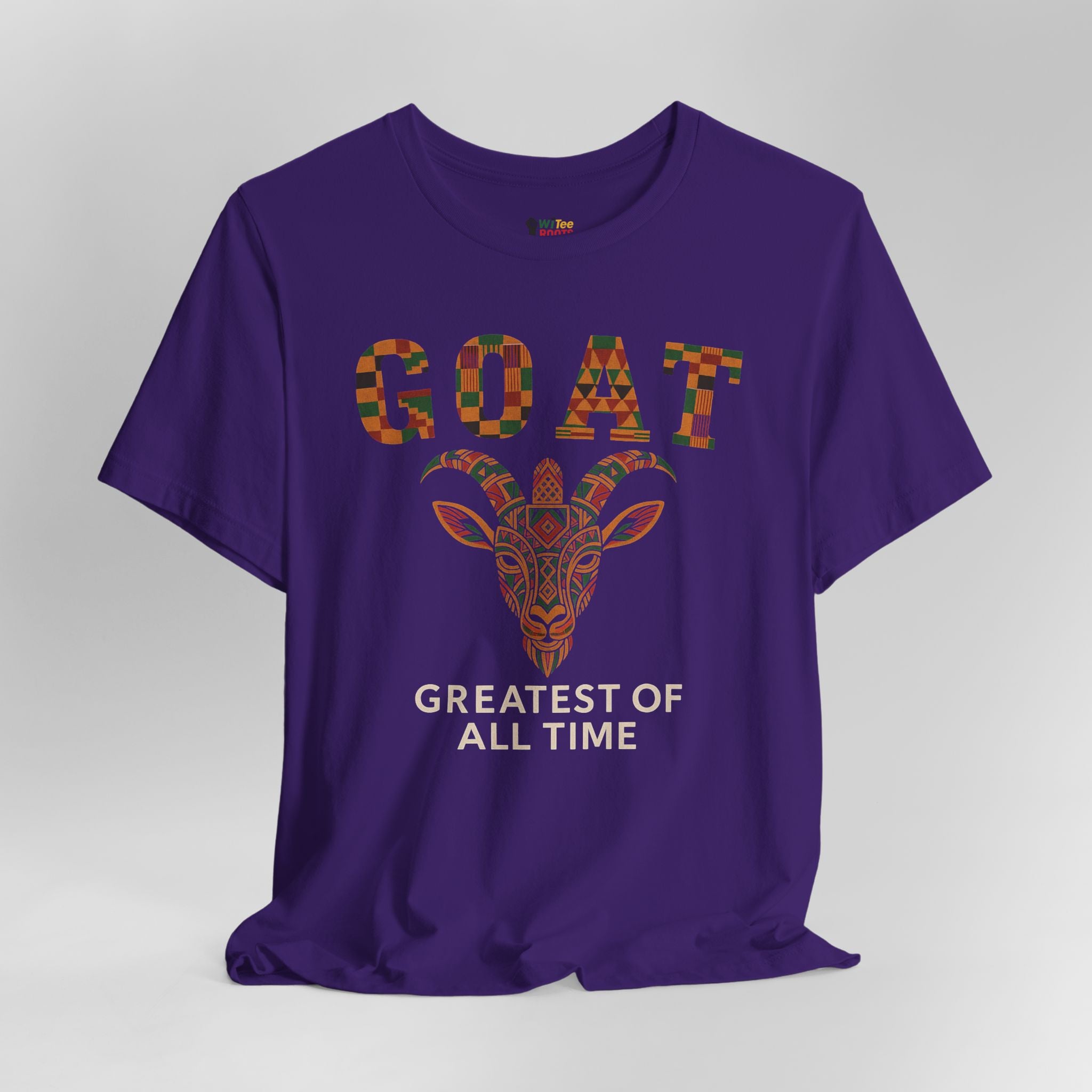 Purple t-shirt with a colorful goat graphic and text on a gray background