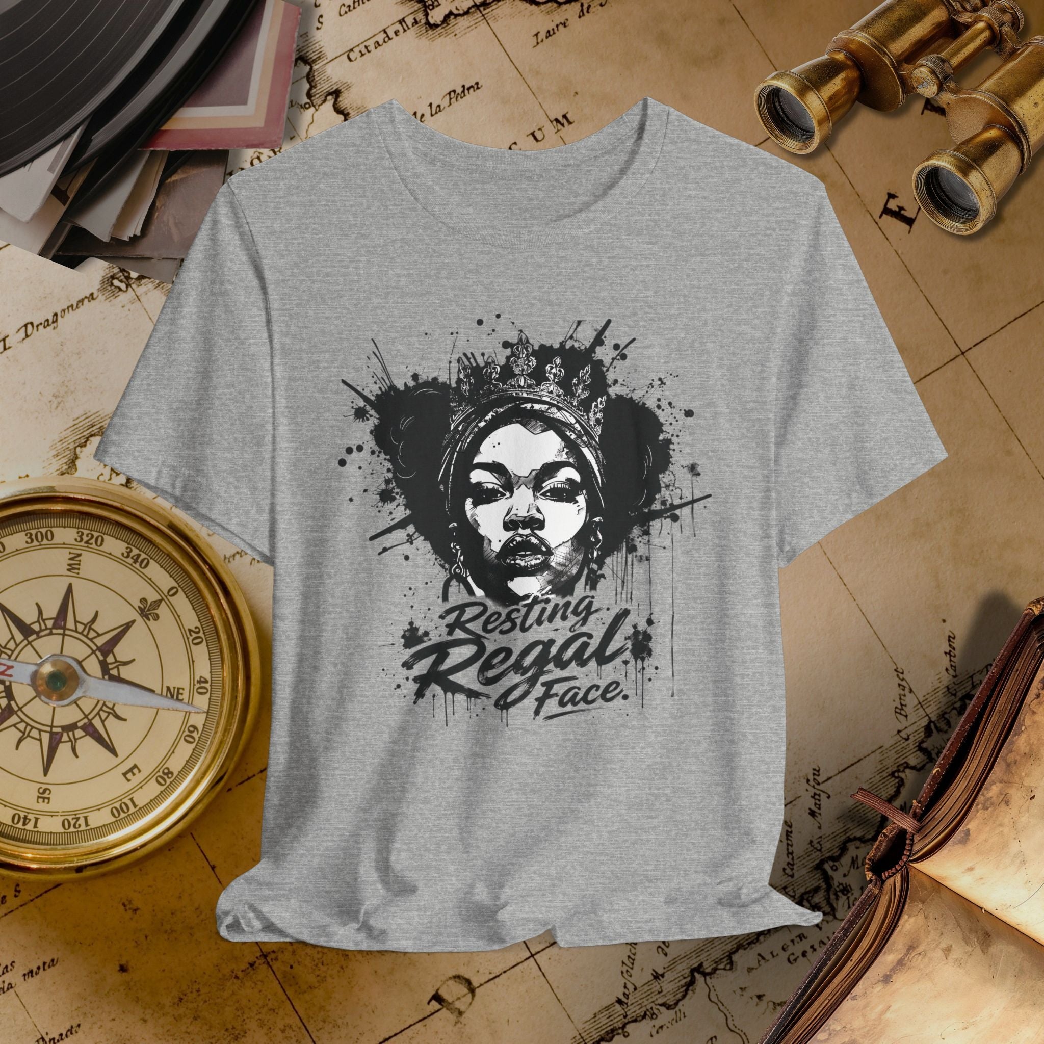 Gray t-shirt with a graphic design on a vintage map background
