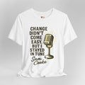 White t-shirt with a microphone graphic and text on a gray background