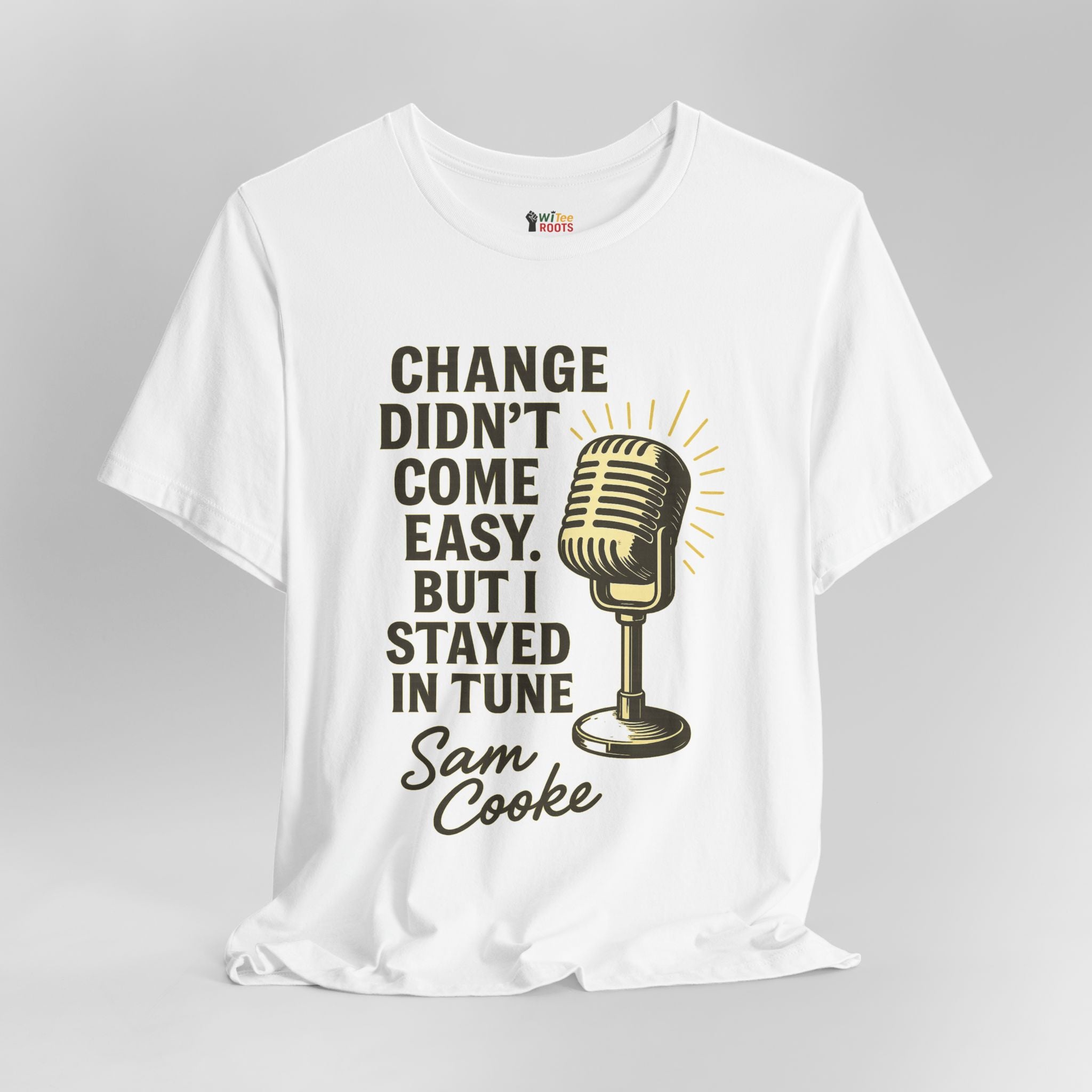 White t-shirt with a microphone graphic and text on a gray background