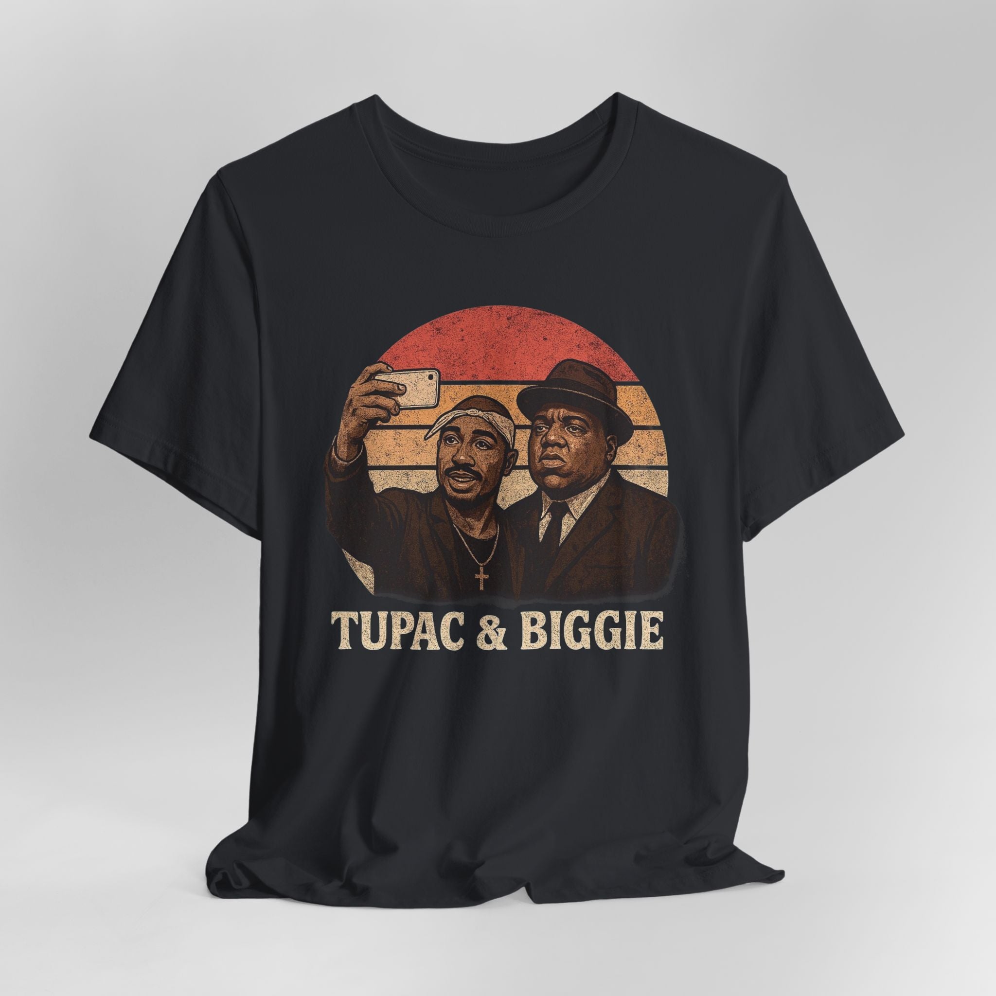 Black t-shirt with graphic of two men and 'Tupac & Biggie' text on a gray background