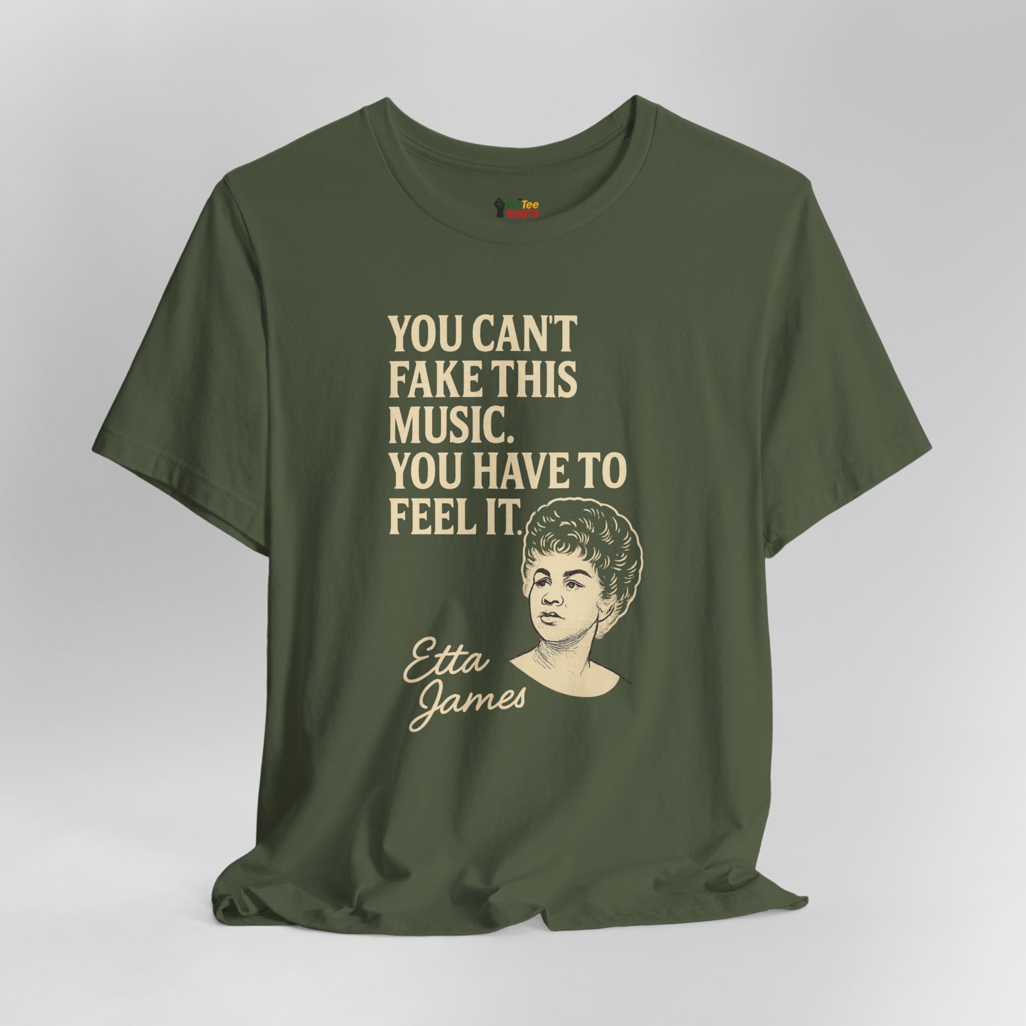 Green t-shirt with text and a portrait of Etta James on a gray background