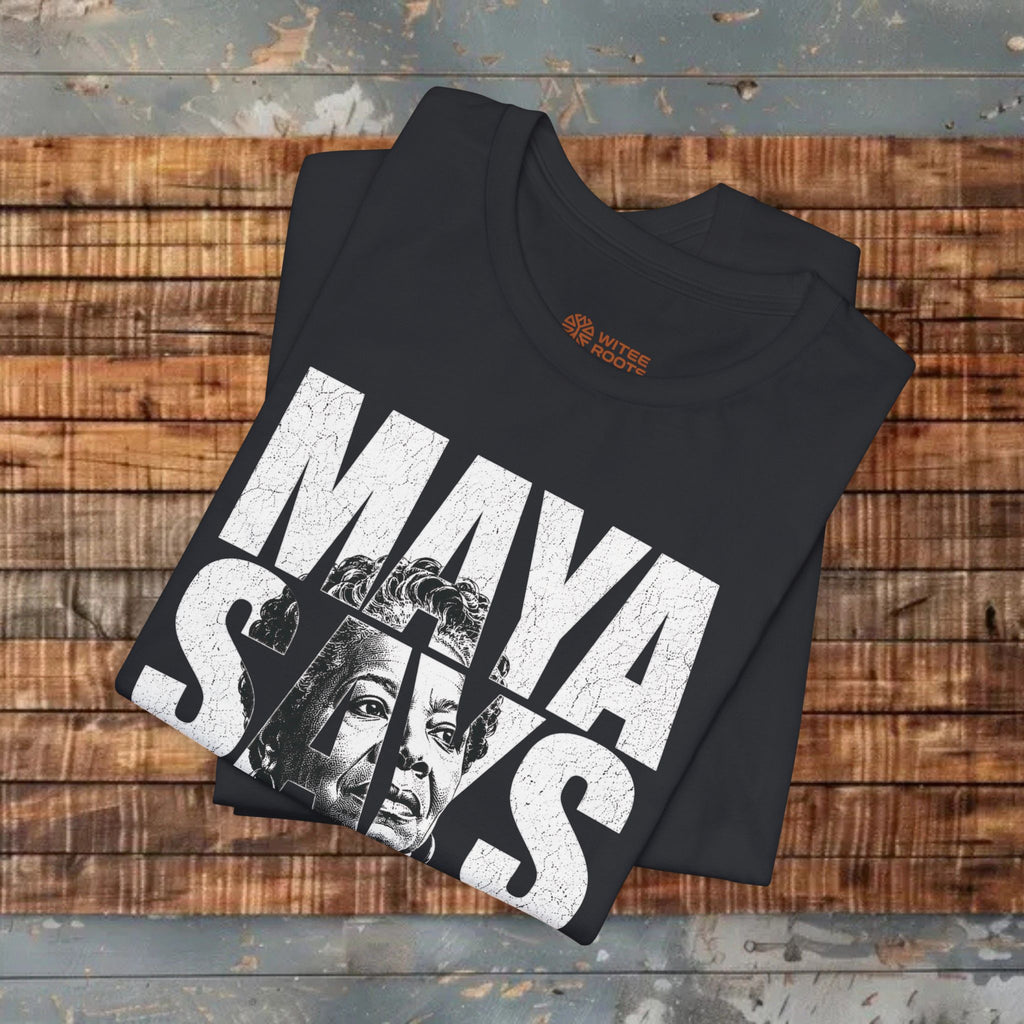 Black t-shirt with 'Maya' graphic design on a wooden surface
