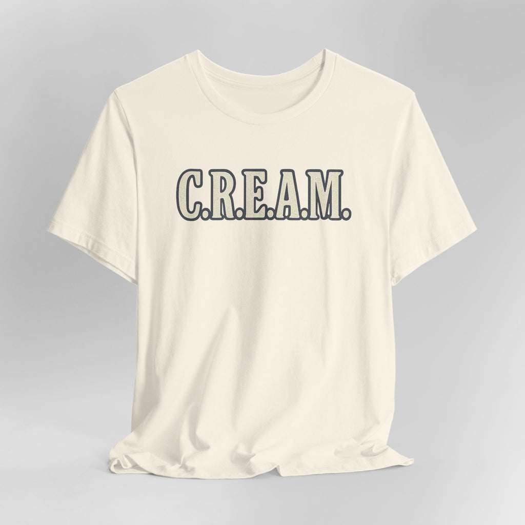 Beige t-shirt with 'C.R.E.A.M.' text on a gray background