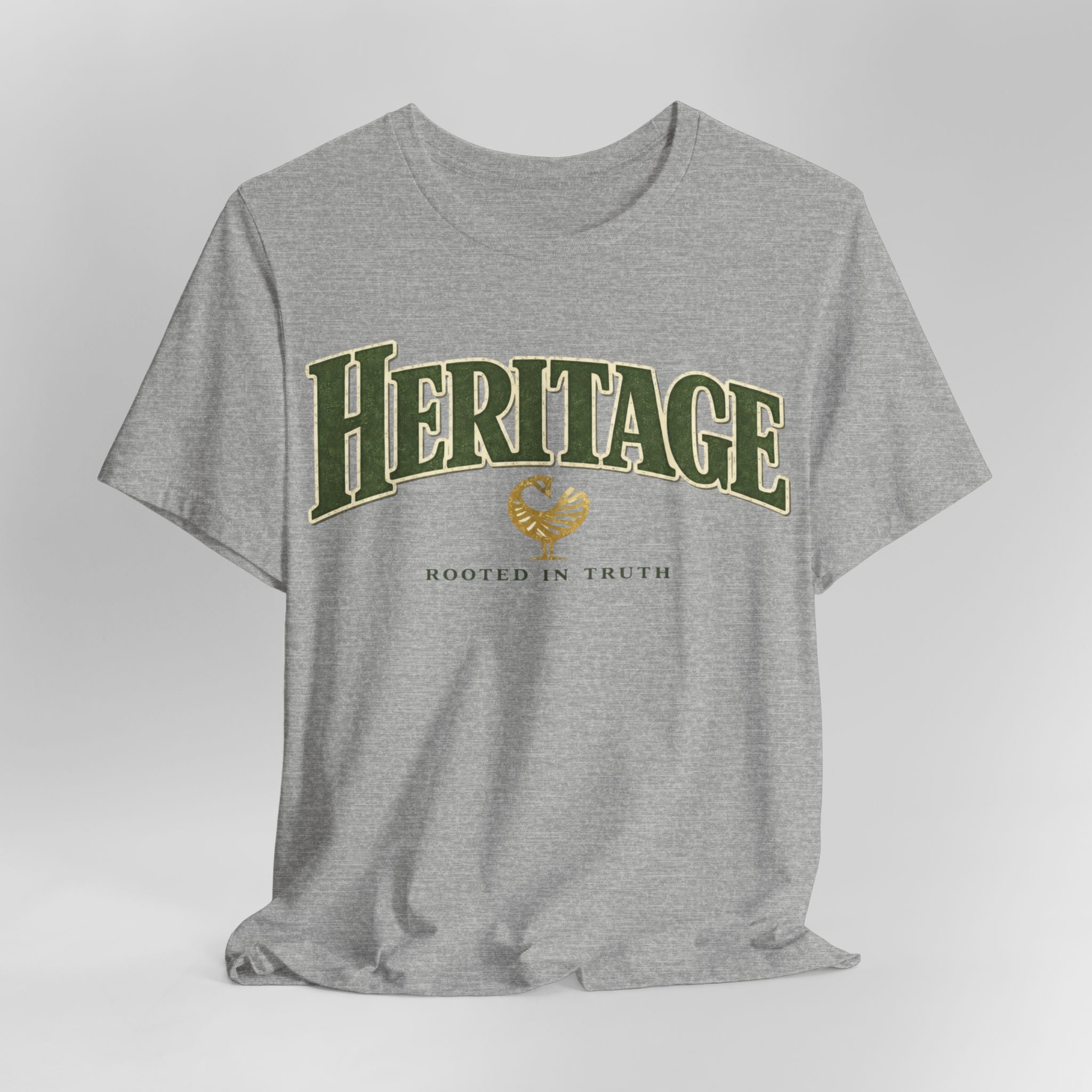Gray t-shirt with 'Heritage Rooted in Truth' text on a light gray background