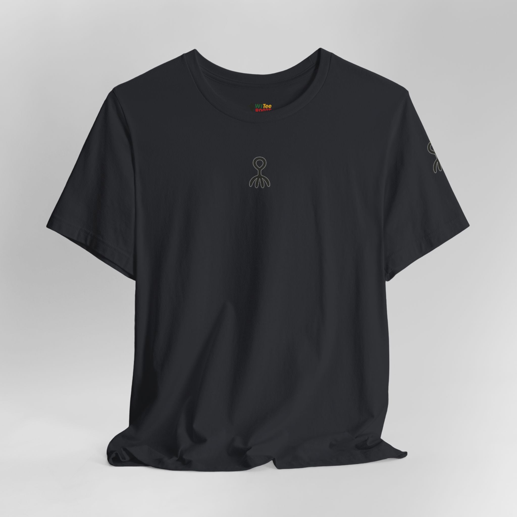 Black t-shirt with a small logo on a light gray background