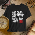 Black t-shirt with white and red text on a vintage map background