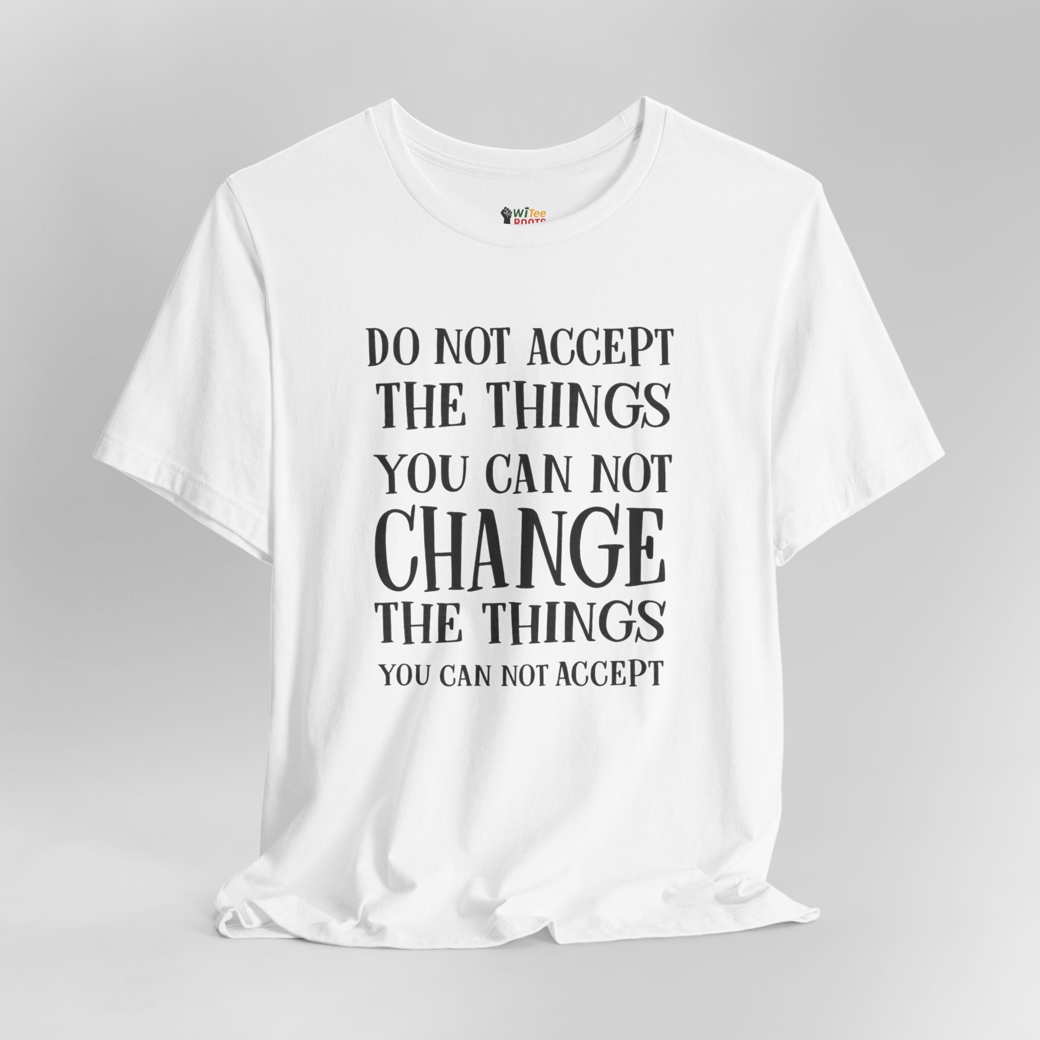 White t-shirt with motivational quote on a gray background