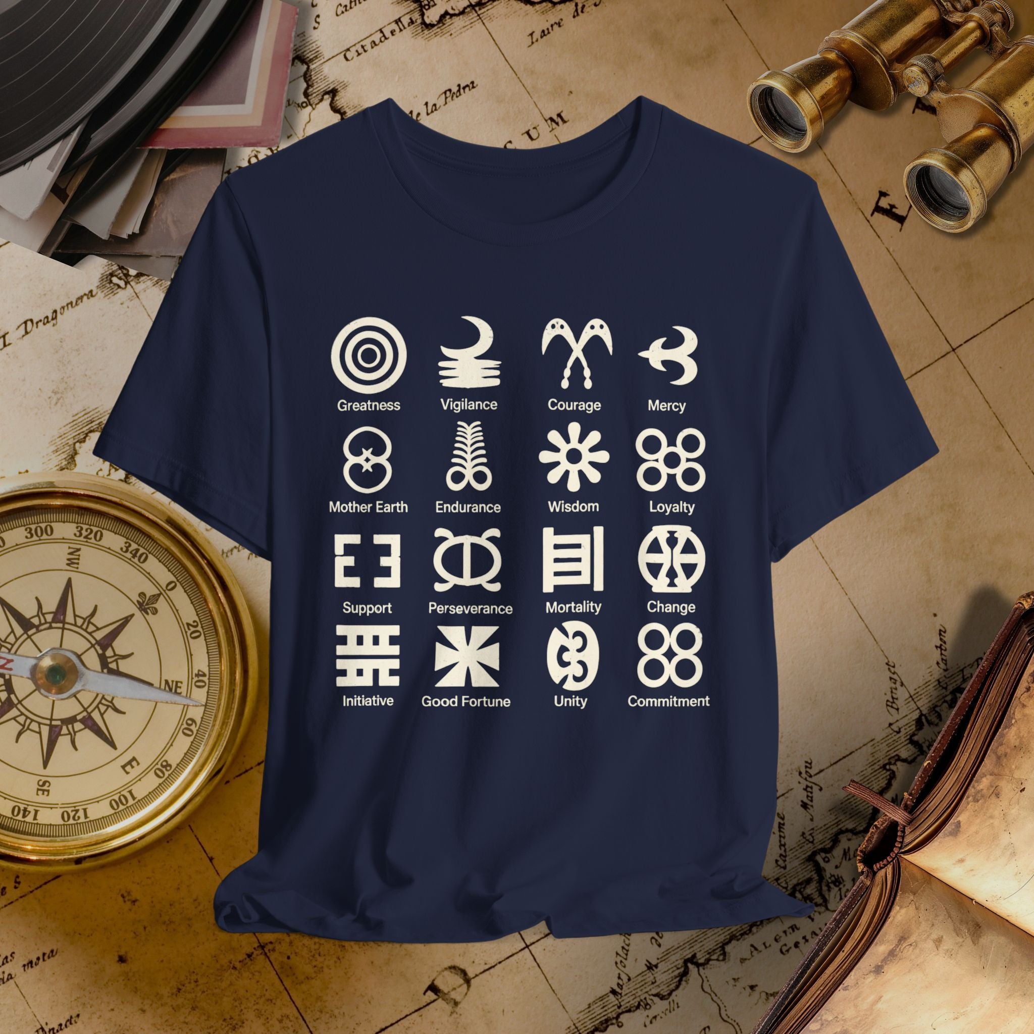 Navy blue t-shirt with white symbols and text on a vintage map background